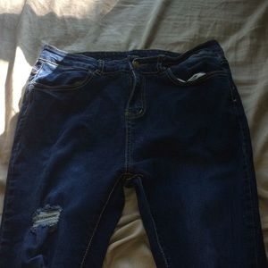 Dark blue ripped skinny jeans